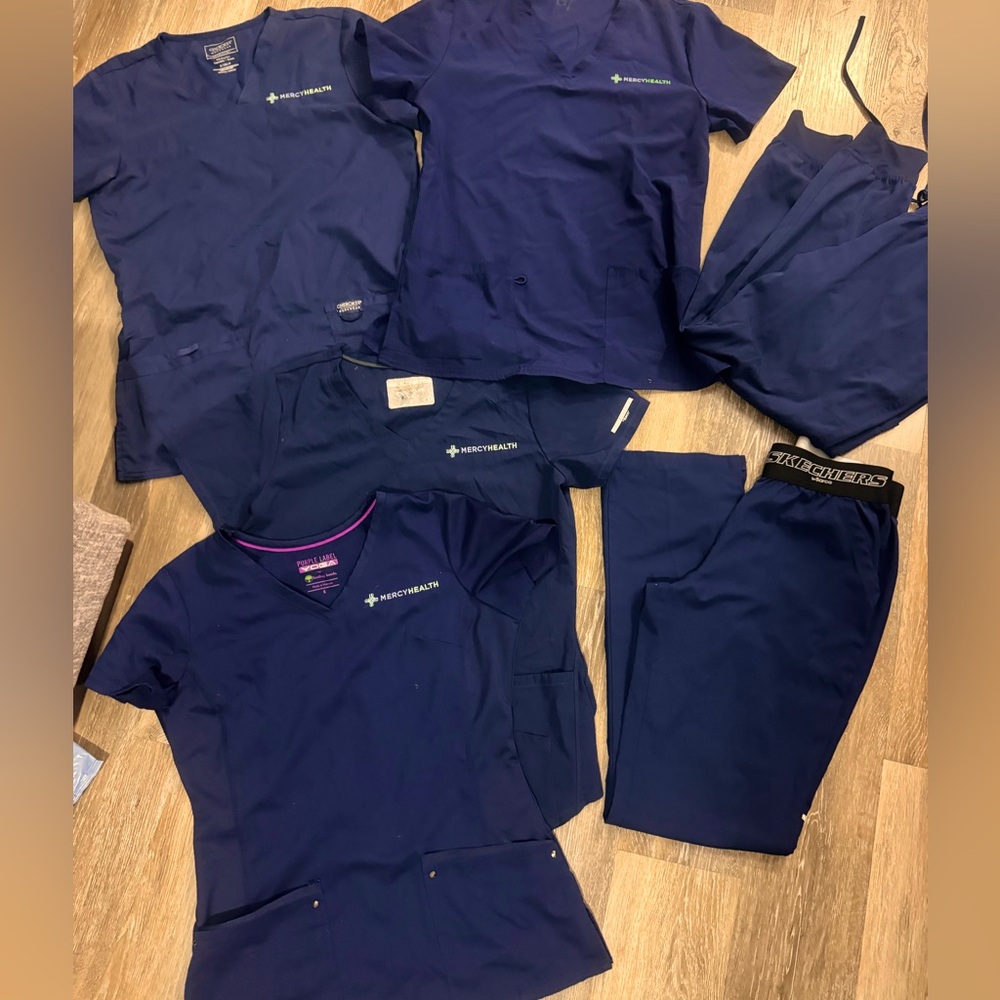 Mercy Health Navy blue scrubs and t shirts